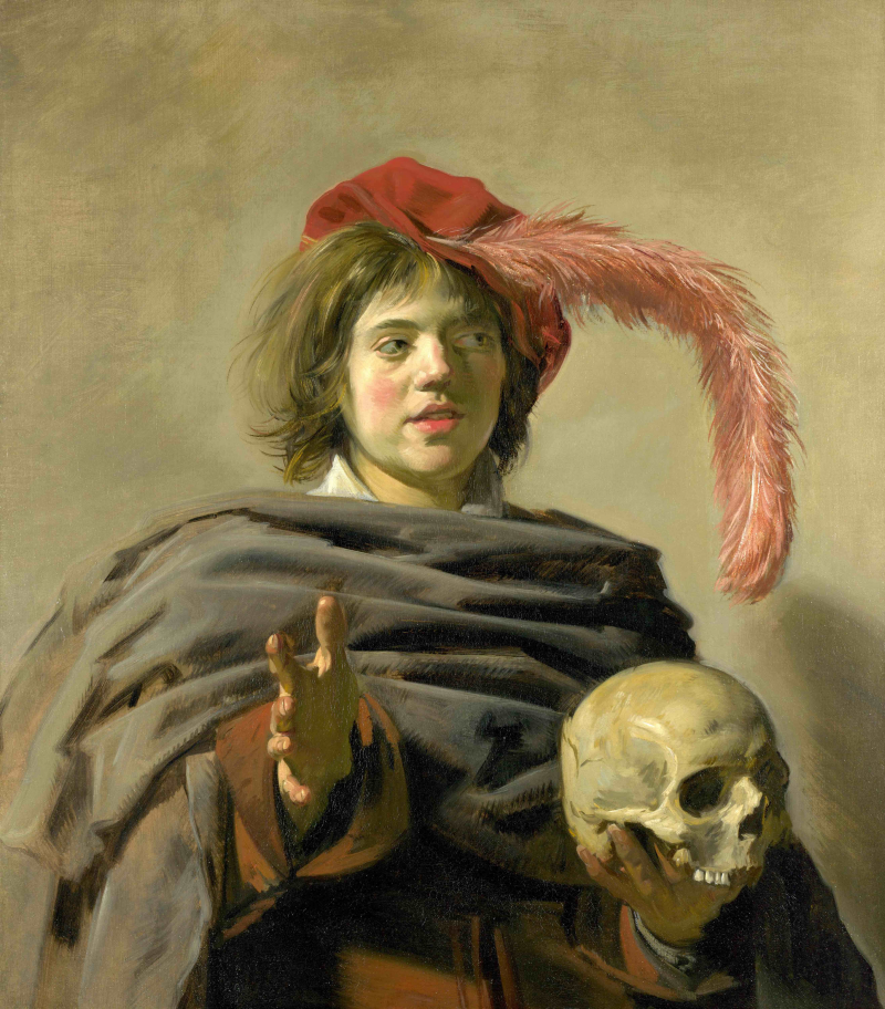 Portret van een jongeman met een schedel